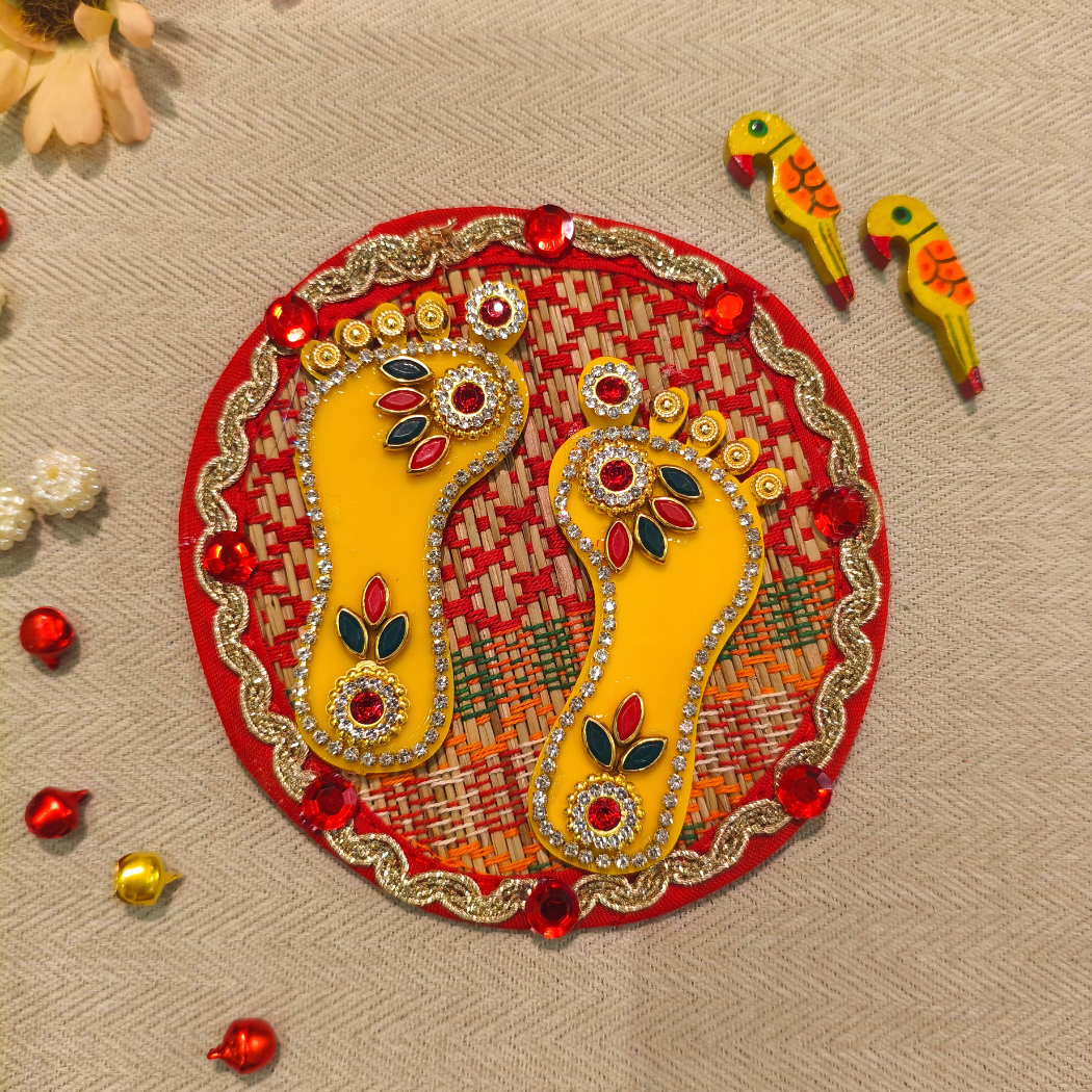 Yellow Laxmi Charan on Round Sikki Mat (Pair)